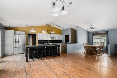 This spacious home has panoramic views of the 14th hole on on Lake Doster Golf Club in Michigan - for sale on GolfHomes.com, golf home, golf lot
