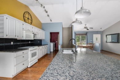 This spacious home has panoramic views of the 14th hole on on Lake Doster Golf Club in Michigan - for sale on GolfHomes.com, golf home, golf lot