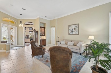 Indulge in your own private sanctuary at Pelican Pointe Golf on Pelican Pointe Golf and Country Club in Florida - for sale on GolfHomes.com, golf home, golf lot