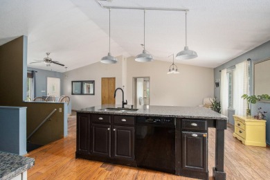 This spacious home has panoramic views of the 14th hole on on Lake Doster Golf Club in Michigan - for sale on GolfHomes.com, golf home, golf lot