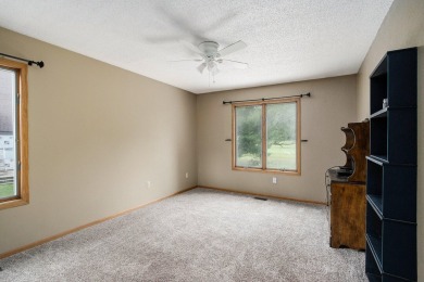 This spacious home has panoramic views of the 14th hole on on Lake Doster Golf Club in Michigan - for sale on GolfHomes.com, golf home, golf lot