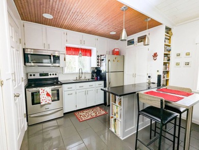 Park your RV under this 40'x20' port with 592 sq.ft. living area on The Great Outdoors Golf and Country Club in Florida - for sale on GolfHomes.com, golf home, golf lot