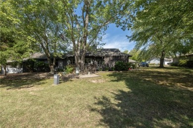 If low maintenance lifestyle and beautiful views are your thing on Bella Vista - Metfield Golf Complex and Country Club in Arkansas - for sale on GolfHomes.com, golf home, golf lot