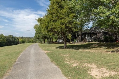 If low maintenance lifestyle and beautiful views are your thing on Bella Vista - Metfield Golf Complex and Country Club in Arkansas - for sale on GolfHomes.com, golf home, golf lot