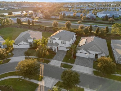 Don't miss this stunning 5-bedroom, 4.5-bath home offering over on The Oasis Club at Champions Gate in Florida - for sale on GolfHomes.com, golf home, golf lot