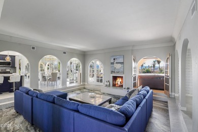 Discover luxury living with stunning mountain, lake, pond, and on London Bridge Golf Course in Arizona - for sale on GolfHomes.com, golf home, golf lot