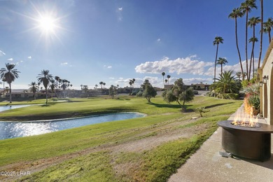 Discover luxury living with stunning mountain, lake, pond, and on London Bridge Golf Course in Arizona - for sale on GolfHomes.com, golf home, golf lot