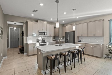 Don't miss this stunning 5-bedroom, 4.5-bath home offering over on The Oasis Club at Champions Gate in Florida - for sale on GolfHomes.com, golf home, golf lot