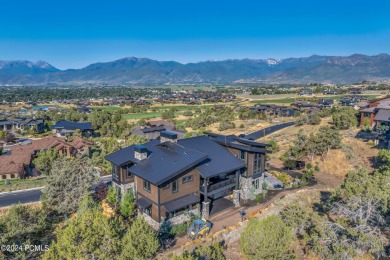 This newly constructed mountain contemporary home is perfectly on Red Ledges Golf Club in Utah - for sale on GolfHomes.com, golf home, golf lot