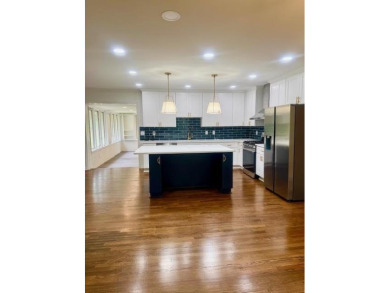 Welcome to this beautifully updated 4-bedroom, 2-bath brick home on Alfred Tup Holmes Golf Course in Georgia - for sale on GolfHomes.com, golf home, golf lot