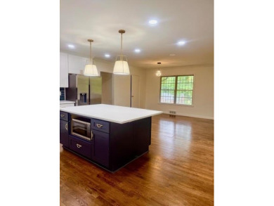 Welcome to this beautifully updated 4-bedroom, 2-bath brick home on Alfred Tup Holmes Golf Course in Georgia - for sale on GolfHomes.com, golf home, golf lot