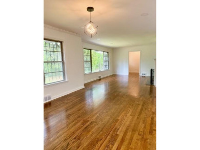 Welcome to this beautifully updated 4-bedroom, 2-bath brick home on Alfred Tup Holmes Golf Course in Georgia - for sale on GolfHomes.com, golf home, golf lot