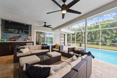 Under contract-accepting backup offers. This 4BR/3BA home is on Seminole Lake Country Club in Florida - for sale on GolfHomes.com, golf home, golf lot