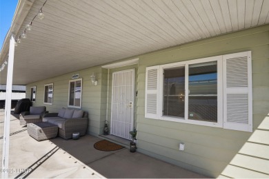 Step inside this mobile home that's been thoughtfully updated on The Refuge Golf and Country Club in Arizona - for sale on GolfHomes.com, golf home, golf lot