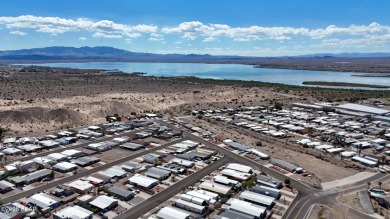 Step inside this mobile home that's been thoughtfully updated on The Refuge Golf and Country Club in Arizona - for sale on GolfHomes.com, golf home, golf lot