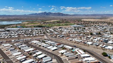 Step inside this mobile home that's been thoughtfully updated on The Refuge Golf and Country Club in Arizona - for sale on GolfHomes.com, golf home, golf lot