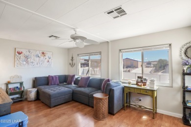 Step inside this mobile home that's been thoughtfully updated on The Refuge Golf and Country Club in Arizona - for sale on GolfHomes.com, golf home, golf lot