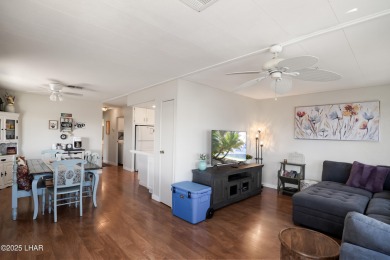 Step inside this mobile home that's been thoughtfully updated on The Refuge Golf and Country Club in Arizona - for sale on GolfHomes.com, golf home, golf lot