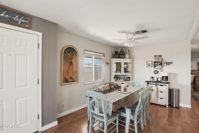 Step inside this mobile home that's been thoughtfully updated on The Refuge Golf and Country Club in Arizona - for sale on GolfHomes.com, golf home, golf lot
