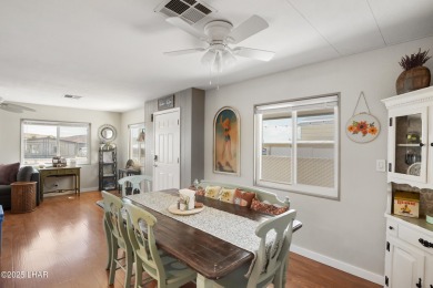 Step inside this mobile home that's been thoughtfully updated on The Refuge Golf and Country Club in Arizona - for sale on GolfHomes.com, golf home, golf lot