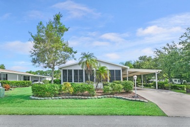 This open and spacious 2 bdrm/ 2 bath home features laminate & on Savanna Golf Club in Florida - for sale on GolfHomes.com, golf home, golf lot