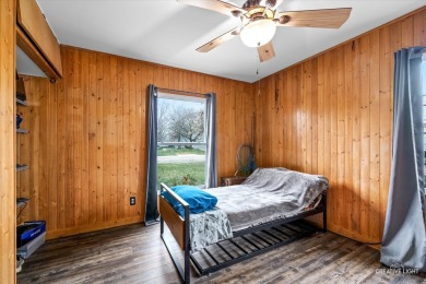 Discover the charm of this updated 4-bedroom, 2-bathroom ranch on Fox Bend Golf Course in Illinois - for sale on GolfHomes.com, golf home, golf lot