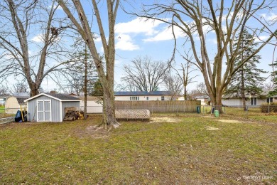 Discover the charm of this updated 4-bedroom, 2-bathroom ranch on Fox Bend Golf Course in Illinois - for sale on GolfHomes.com, golf home, golf lot