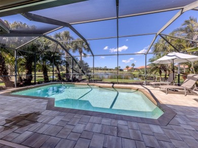 Stunning lake, golf and sunset views with maintenance-free on Venetian Golf and River Club in Florida - for sale on GolfHomes.com, golf home, golf lot
