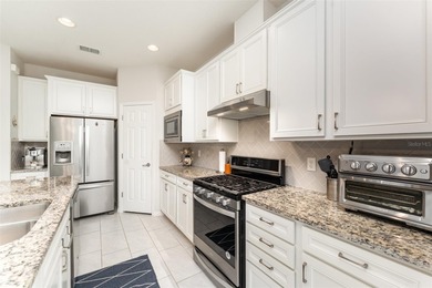 Under contract-accepting backup offers. Exceptional Summerwood on Ridgewood Lakes Golf and Country Club in Florida - for sale on GolfHomes.com, golf home, golf lot