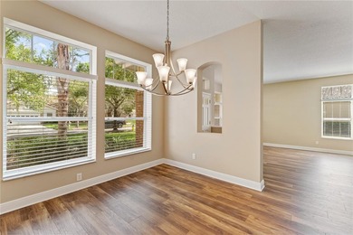 Home near country club amenities o Screened porch outdoor living on Hunters Green Country Club in Florida - for sale on GolfHomes.com, golf home, golf lot