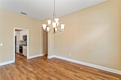 Home near country club amenities o Screened porch outdoor living on Hunters Green Country Club in Florida - for sale on GolfHomes.com, golf home, golf lot