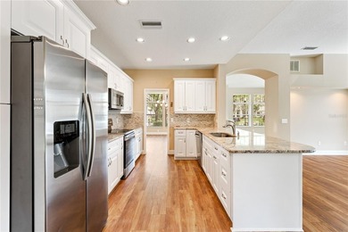 Home near country club amenities o Screened porch outdoor living on Hunters Green Country Club in Florida - for sale on GolfHomes.com, golf home, golf lot