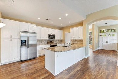 Home near country club amenities o Screened porch outdoor living on Hunters Green Country Club in Florida - for sale on GolfHomes.com, golf home, golf lot