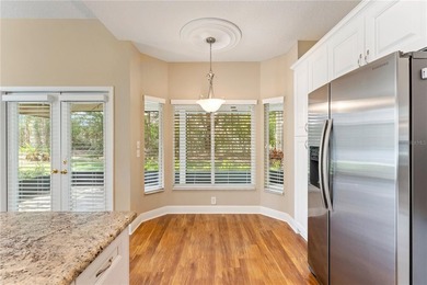 Home near country club amenities o Screened porch outdoor living on Hunters Green Country Club in Florida - for sale on GolfHomes.com, golf home, golf lot