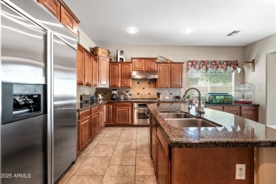 This luxurious 5 bedroom, 3.5 bath home by TW Lewis is now on Palm Valley Golf Club  in Arizona - for sale on GolfHomes.com, golf home, golf lot