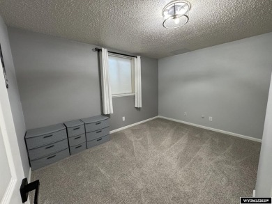 Welcome to this beautifully updated tri-level home at 3820 on Riverton Country Club in Wyoming - for sale on GolfHomes.com, golf home, golf lot