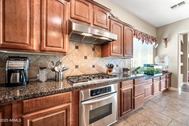This luxurious 5 bedroom, 3.5 bath home by TW Lewis is now on Palm Valley Golf Club  in Arizona - for sale on GolfHomes.com, golf home, golf lot