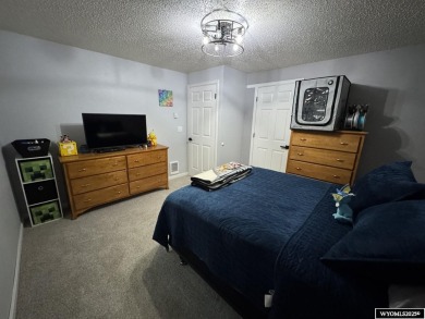 Welcome to this beautifully updated tri-level home at 3820 on Riverton Country Club in Wyoming - for sale on GolfHomes.com, golf home, golf lot
