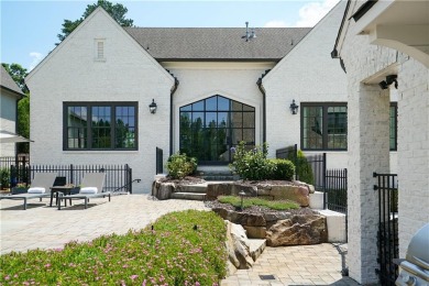 Welcome to a one-of-a-kind custom estate perched on the largest on Manor Golf and Country Club in Georgia - for sale on GolfHomes.com, golf home, golf lot
