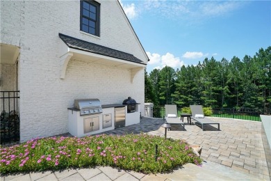 Welcome to a one-of-a-kind custom estate perched on the largest on Manor Golf and Country Club in Georgia - for sale on GolfHomes.com, golf home, golf lot