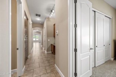 This luxurious 5 bedroom, 3.5 bath home by TW Lewis is now on Palm Valley Golf Club  in Arizona - for sale on GolfHomes.com, golf home, golf lot