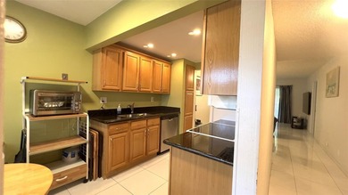 Check out this beautifully maintained 2/2 condo with stunning on Colony West Country Club in Florida - for sale on GolfHomes.com, golf home, golf lot