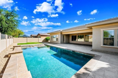 This luxurious 5 bedroom, 3.5 bath home by TW Lewis is now on Palm Valley Golf Club  in Arizona - for sale on GolfHomes.com, golf home, golf lot