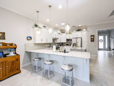 Stunning 3 bedroom 2.5 bathroom open concept resort home on The Great Outdoors Golf and Country Club in Florida - for sale on GolfHomes.com, golf home, golf lot