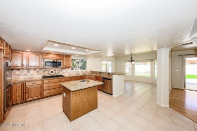 This one has it all!  5 bedrooms, 3 bathrooms, 2 dining areas, 2 on El Conquistador Country Club - Conquistador in Arizona - for sale on GolfHomes.com, golf home, golf lot