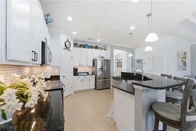 GOLF & WATER VIEW *** PRIVATE POOL/SPA HOME! Prime views and on Herons Glen Golf and Country Club in Florida - for sale on GolfHomes.com, golf home, golf lot