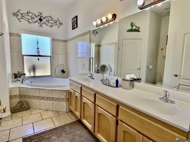 Welcome to this stunning 3-bed, 2-bath contemporary home nestled on Foothills Executive Golf Course in Arizona - for sale on GolfHomes.com, golf home, golf lot