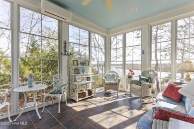 Welcome to this exquisite riverfront property, located in a golf on Carolina National Golf Club in North Carolina - for sale on GolfHomes.com, golf home, golf lot