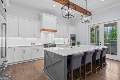 Welcome to 590 Ridgewater Drive, where thoughtful design on Indian Hills Country Club in Georgia - for sale on GolfHomes.com, golf home, golf lot