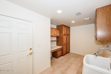This one has it all!  5 bedrooms, 3 bathrooms, 2 dining areas, 2 on El Conquistador Country Club - Conquistador in Arizona - for sale on GolfHomes.com, golf home, golf lot